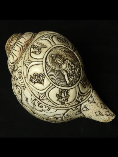 Conque Tibétaine Bouddha